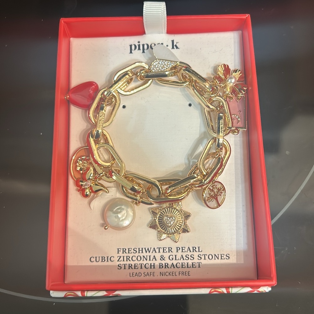 Gold Charm Bracelet with Pink and White Accents